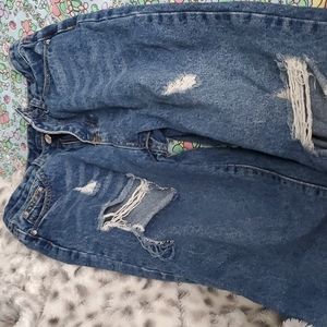 Ripped jeans (don't know brand)